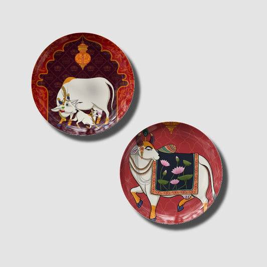 Sacred Herd: Pichwai Cow Wall Plates (Set of 2) by The Atrang