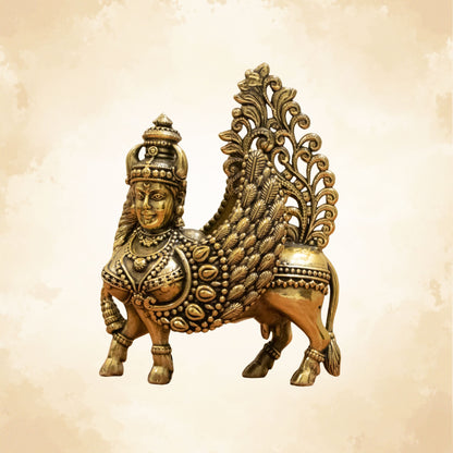 Brass Kamdhenu cow idol symbolizing prosperity and abundance