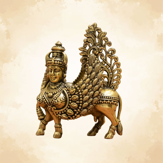 Brass Kamdhenu cow idol symbolizing prosperity and abundance