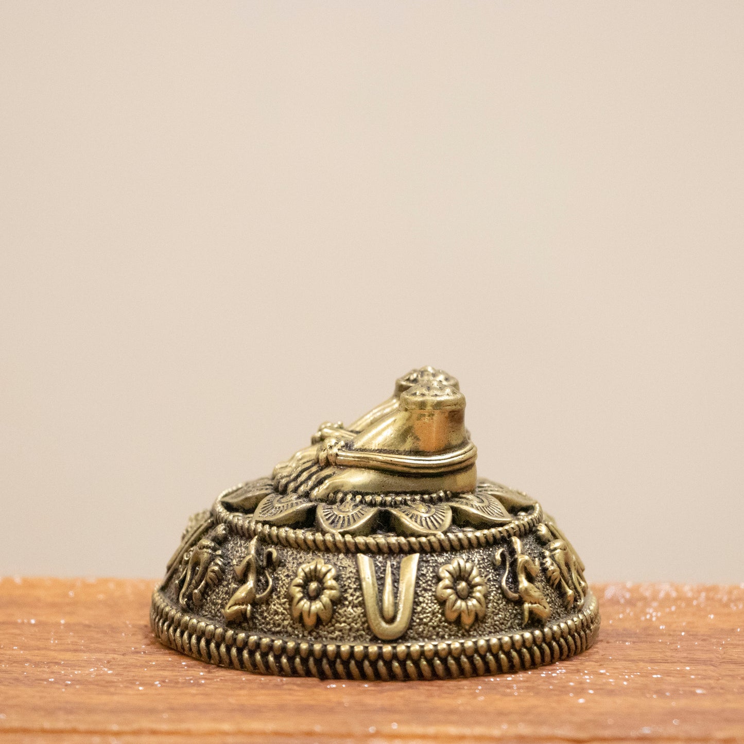 Brass Charan Paduka Idol with Carved Decorative Base